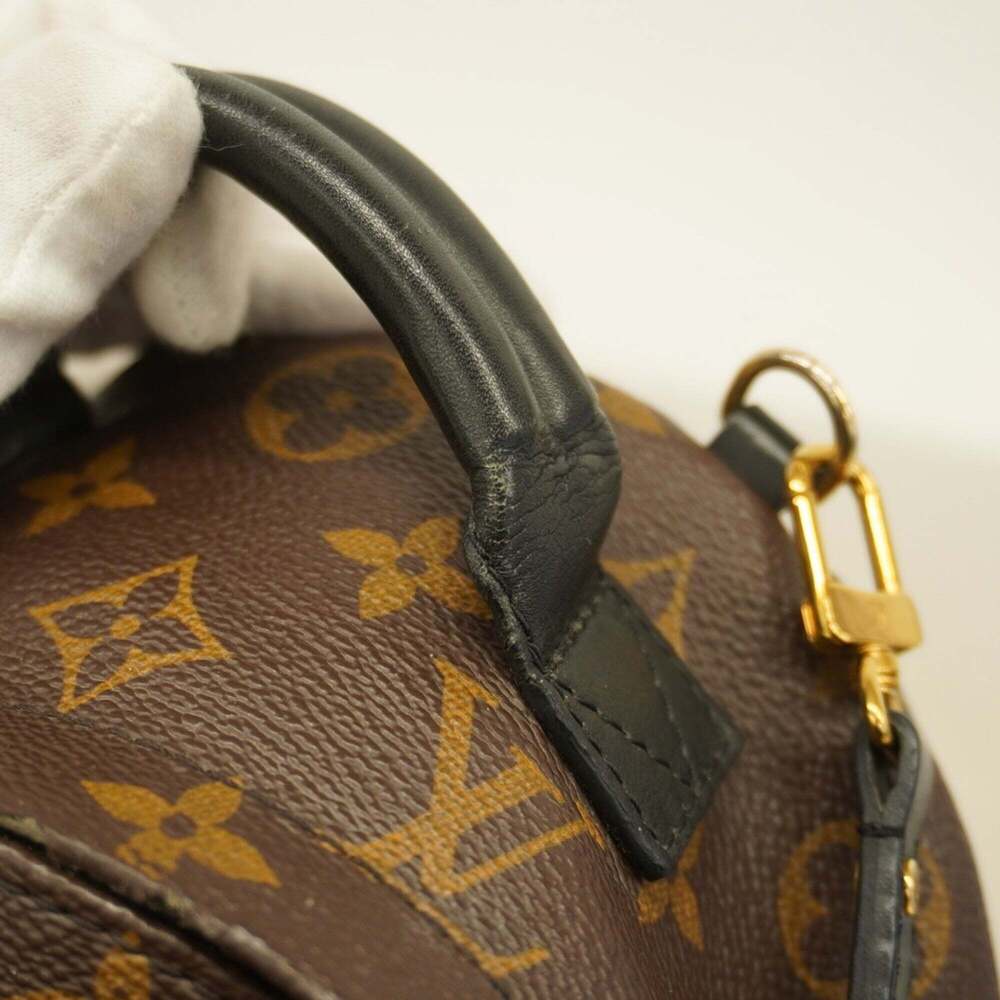 LOUIS VUITTON Brown Monogram Backpack - Picture 9 of 13